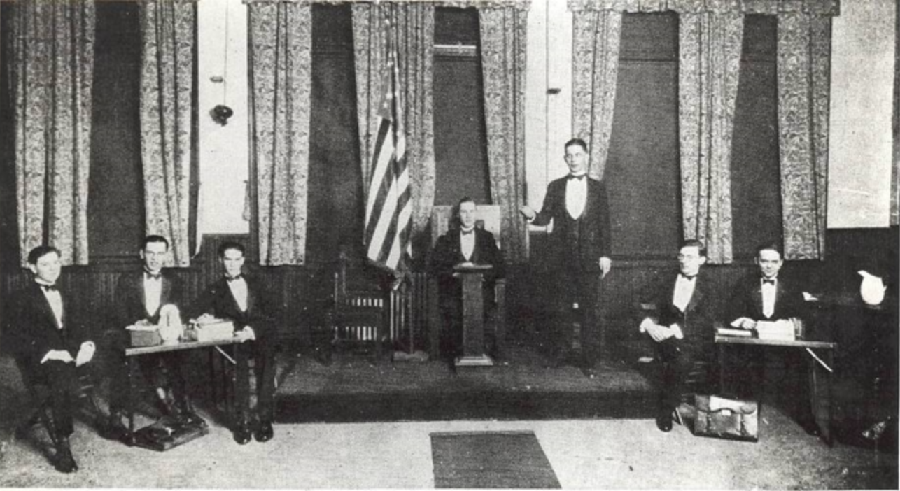 The Loyola University Chicago Debate Society competes against St. Xavier's College in 1926. (Courtesy photo/Loyola University Chicago Archives)